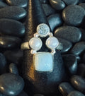 STERLING SILVER RING WITH TOPAZ, LARIMER, AND TWO PEARLS - SIZE 6.25